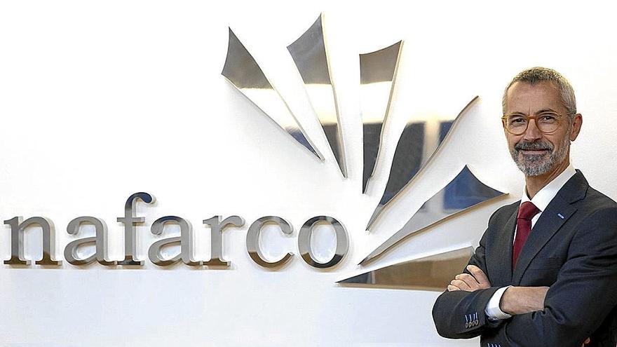 Presidente de Nafarco posando junto al logotipo corporativo de la cooperativa, en una imagen institucional.